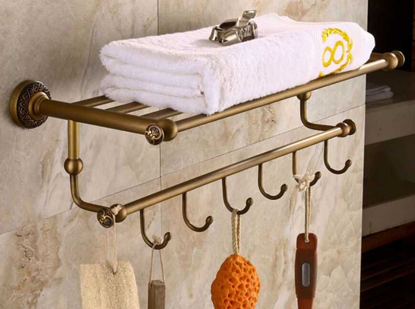Вешалка для полотенец в ванную: разновидности, преимущества и способы установки