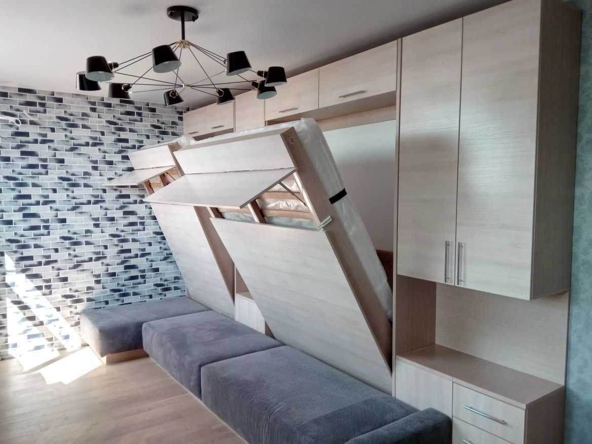 Кровать в дизайне интерьера гостиной