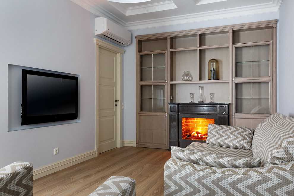 Гостиная с камином в квартире (56 фото): варианты дизайна интерьера зала площадью 18 кв. м с камином, оформление в современном и других стилях