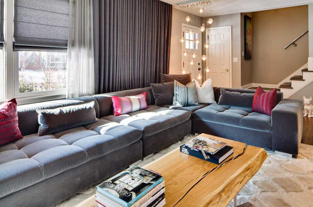 Угловые диваны в интерьере гостиной: преимущества, фото